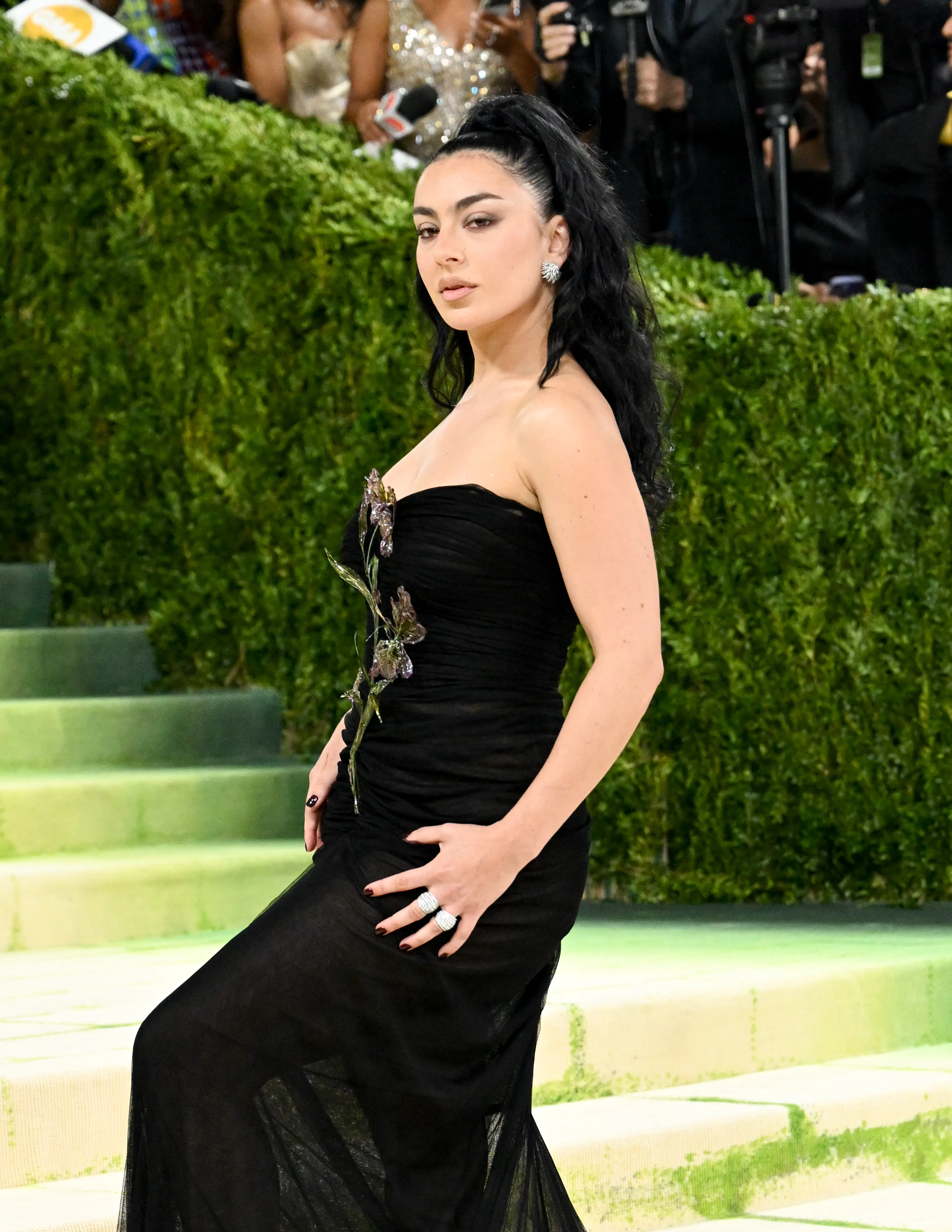 Charli xcx at The 2026 Met Gala with a long and full black ponytail