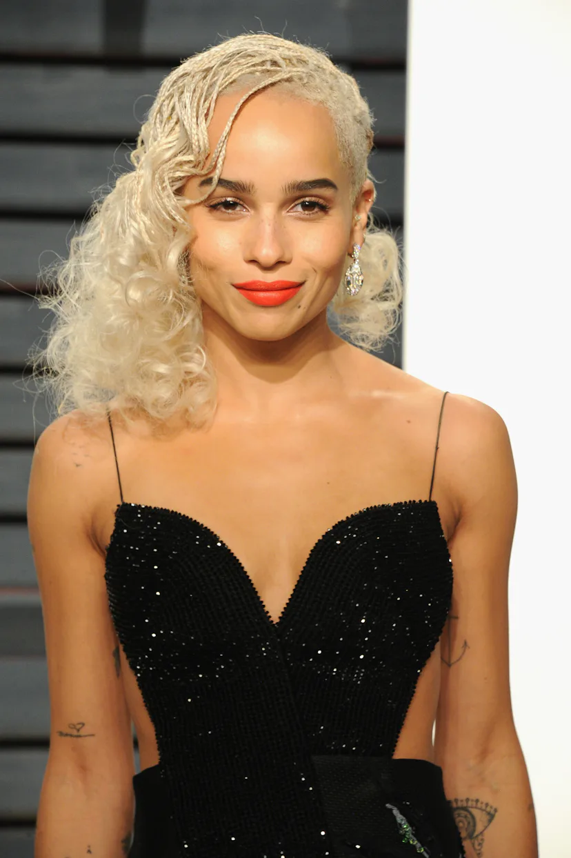 Actress Zoe Kravitz attends the 2017 Vanity Fair Oscar Party with platinum blonde hair styled like a...