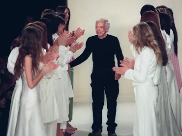 Designer Ralph Lauren (C) receives applause from models after his fashion show 04 November in New Yo...