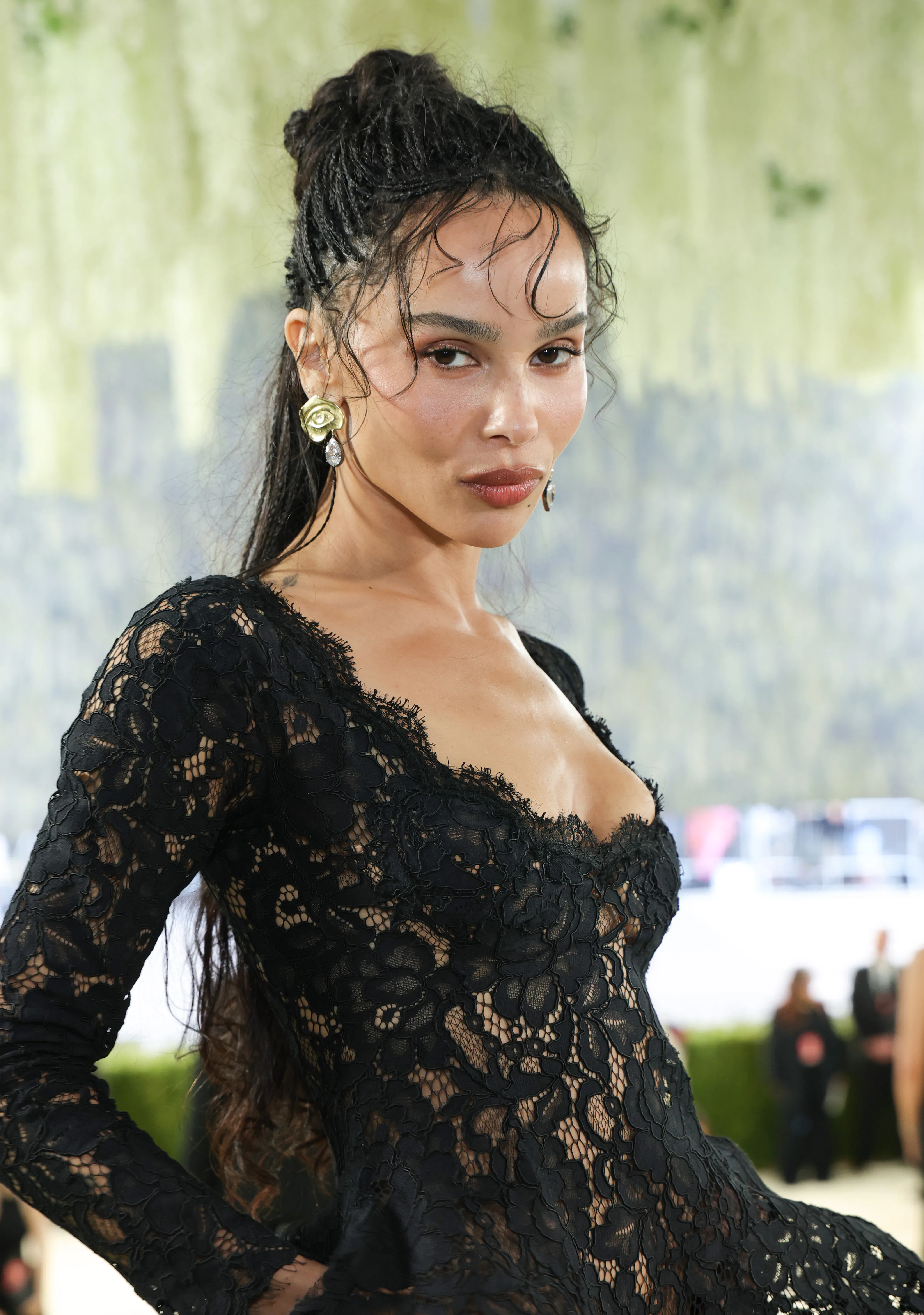 Zoë Kravitz attends the 2026 Met Gala with romantic wispy braids and soft makeup