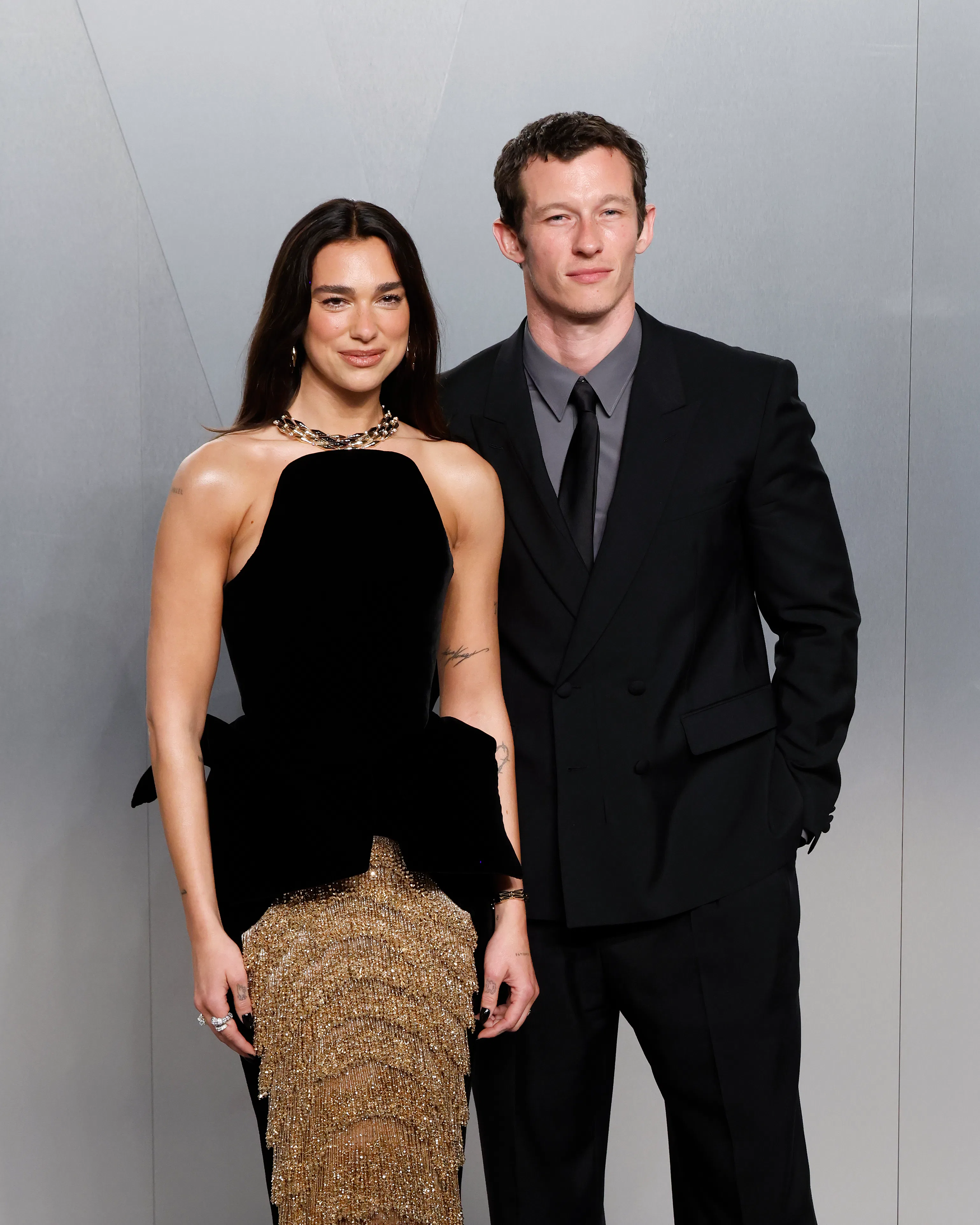 Dua Lipa and Callum Turner on the red carpet