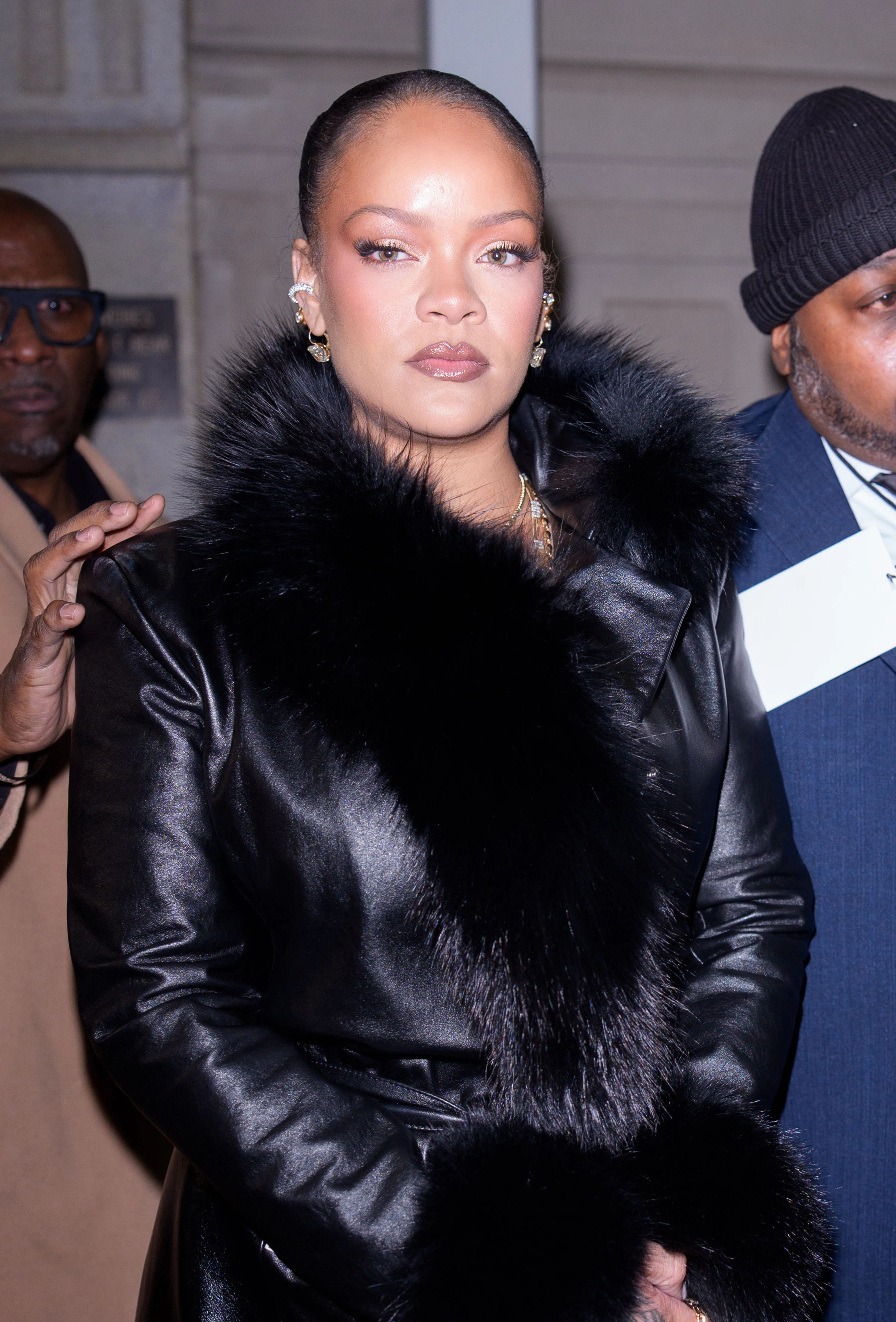 Rihanna with a slicked-back updo