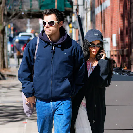 Zoë Kravitz and Harry Styles were seen with matching "Let it rip" tattoos.