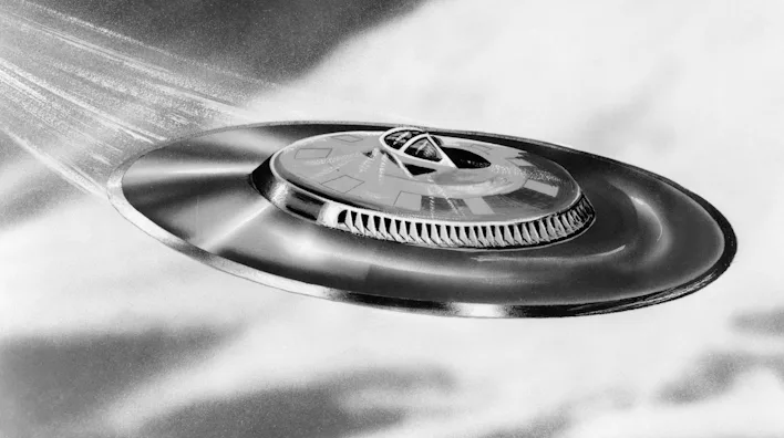 1950s ARTIST'S CONCEPTION UFO FLYING SAUCER (Photo by H. Armstrong Roberts/ClassicStock/Getty Image...