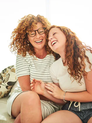 Shot of a happy mother and daughter spending some quality time together at home
