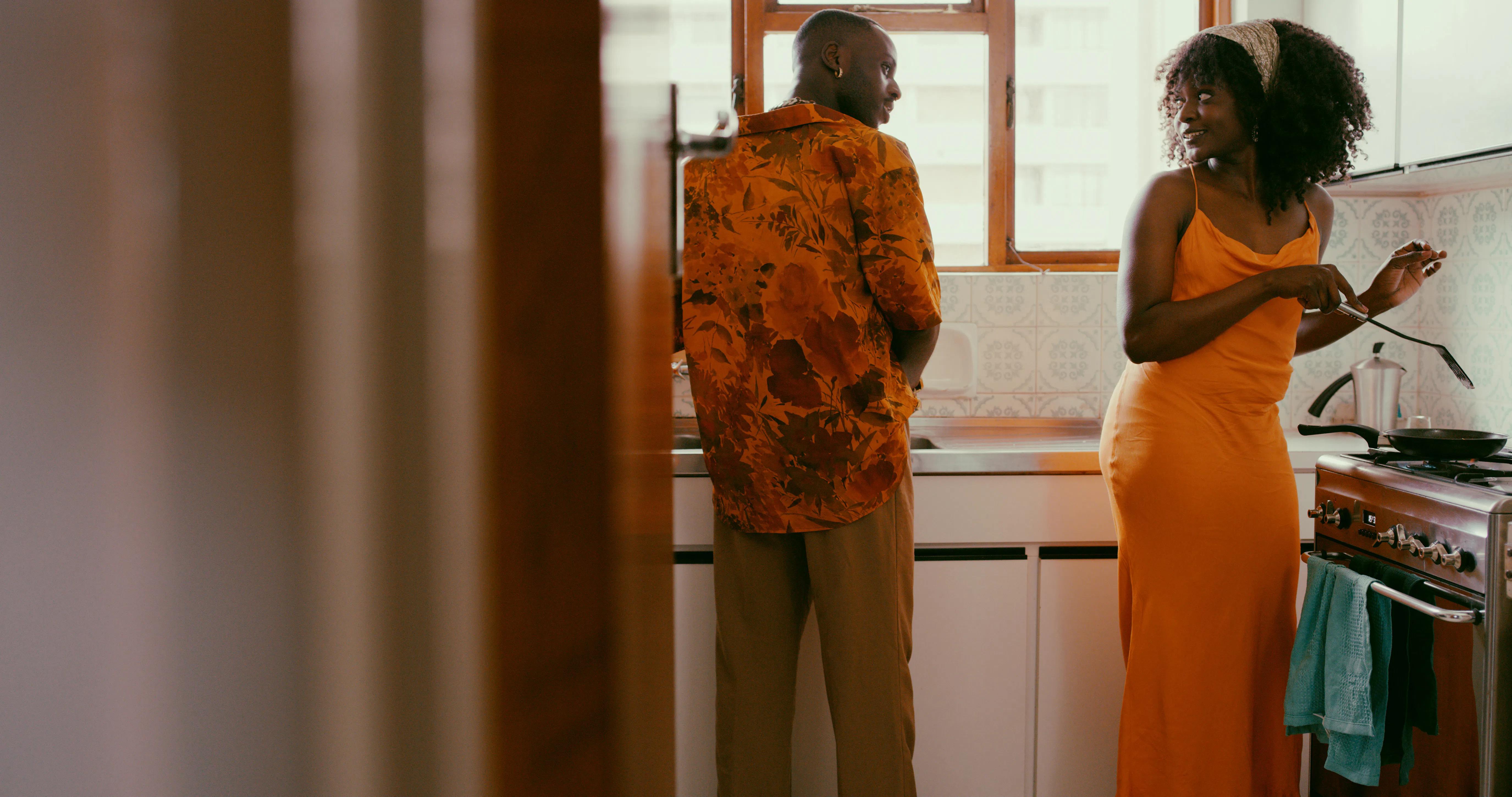 Shot of a young couple preparing a meal together at home