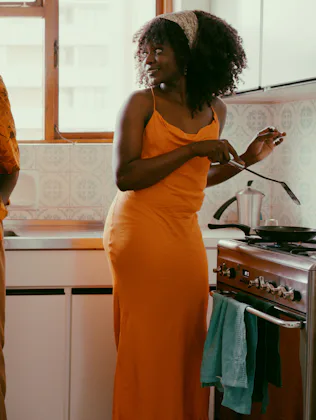 Shot of a young couple preparing a meal together at home