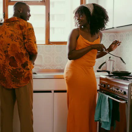 Shot of a young couple preparing a meal together at home