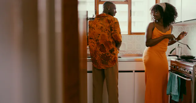 Shot of a young couple preparing a meal together at home
