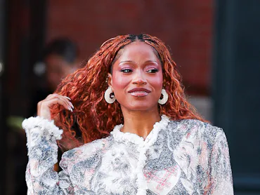Keke Palmer opened up about her rumored romance with 'Hot Ones' host Sean Evans.