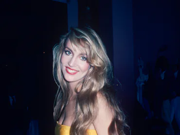 Jerry Hall in a yellow strapless dress; circa 1978; New York. (Photo by Art Zelin/Getty Images)