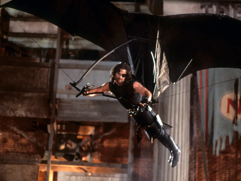 Kurt Russell hang-gliding in a scene from the film 'Escape From L.A.', 1996. (Photo by Paramount/Get...
