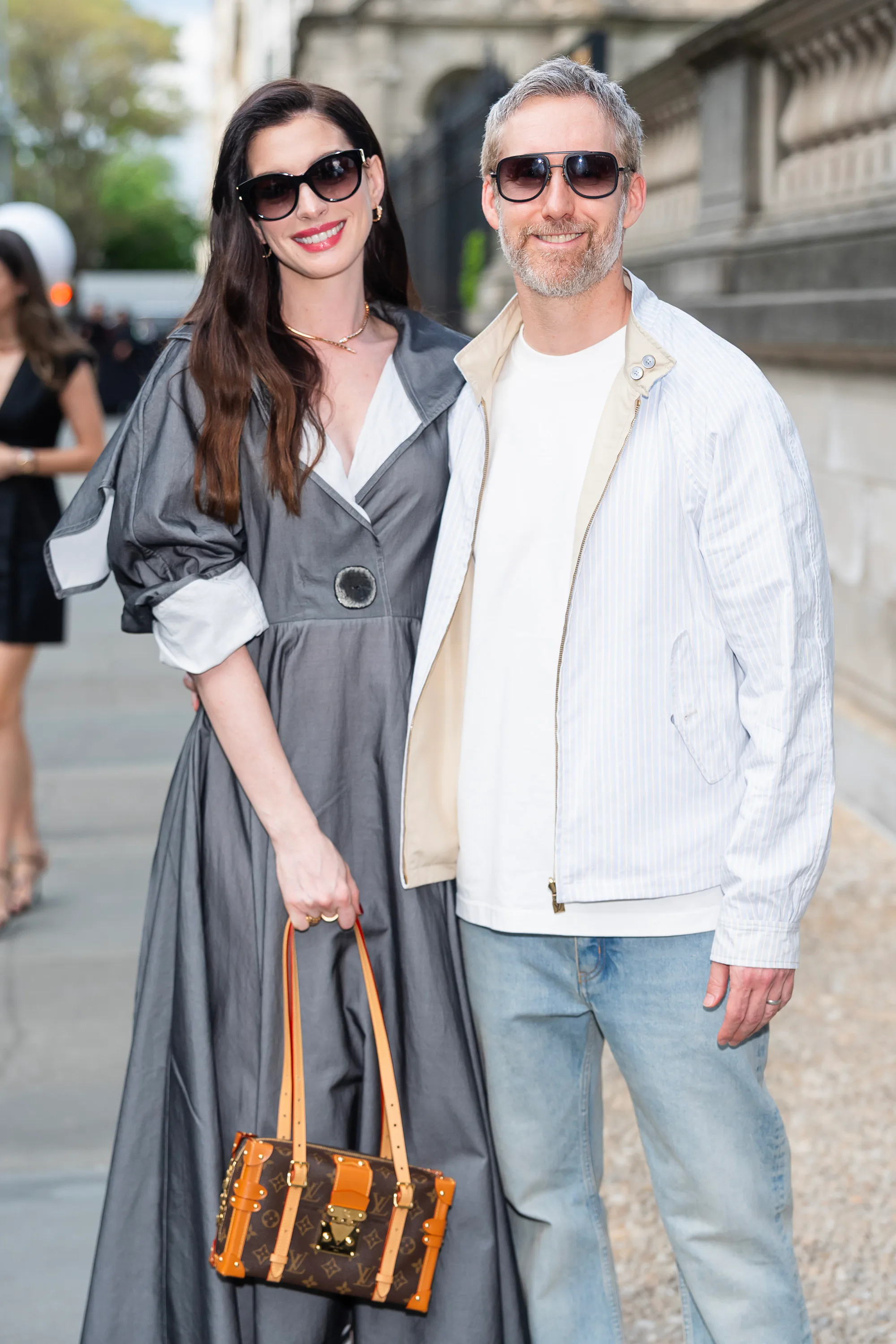 Anne Hathaway and Adam Shulman at the Louis Vuitton Cruise 2027 show in New York City.
