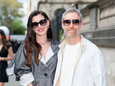 Anne Hathaway and Adam Shulman at the Louis Vuitton Cruise 2027 show in New York City.