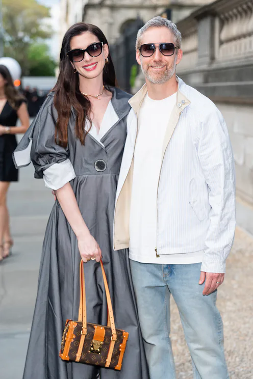 Anne Hathaway and Adam Shulman at the Louis Vuitton Cruise 2027 show in New York City.