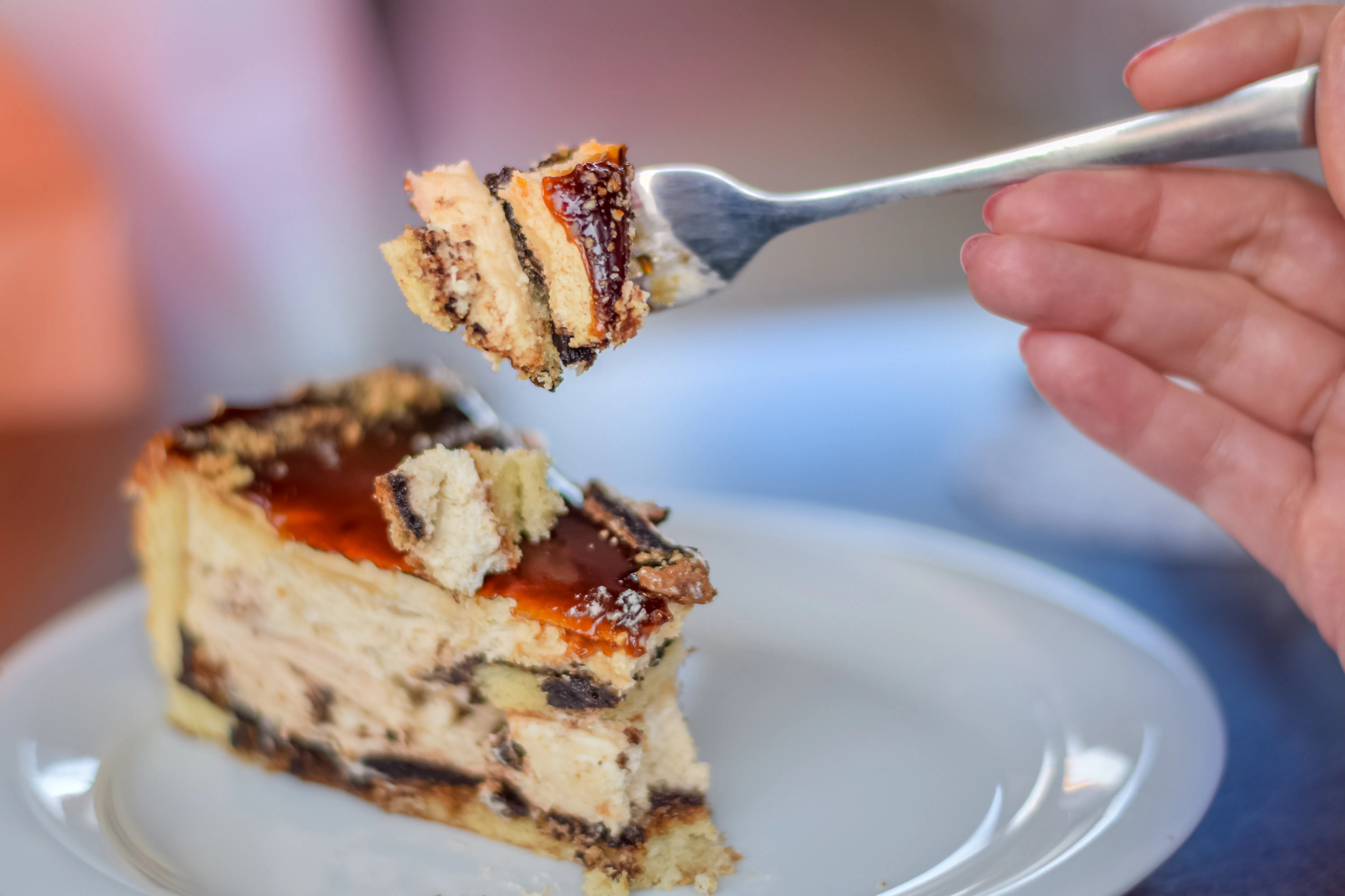 A low depth of field of a close up of a cake bite on a fork