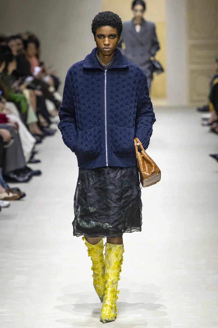 MILAN, ITALY - FEBRUARY 26: A model walks the runway at the Prada Ready to Wear Fall/Winter 2026/202...