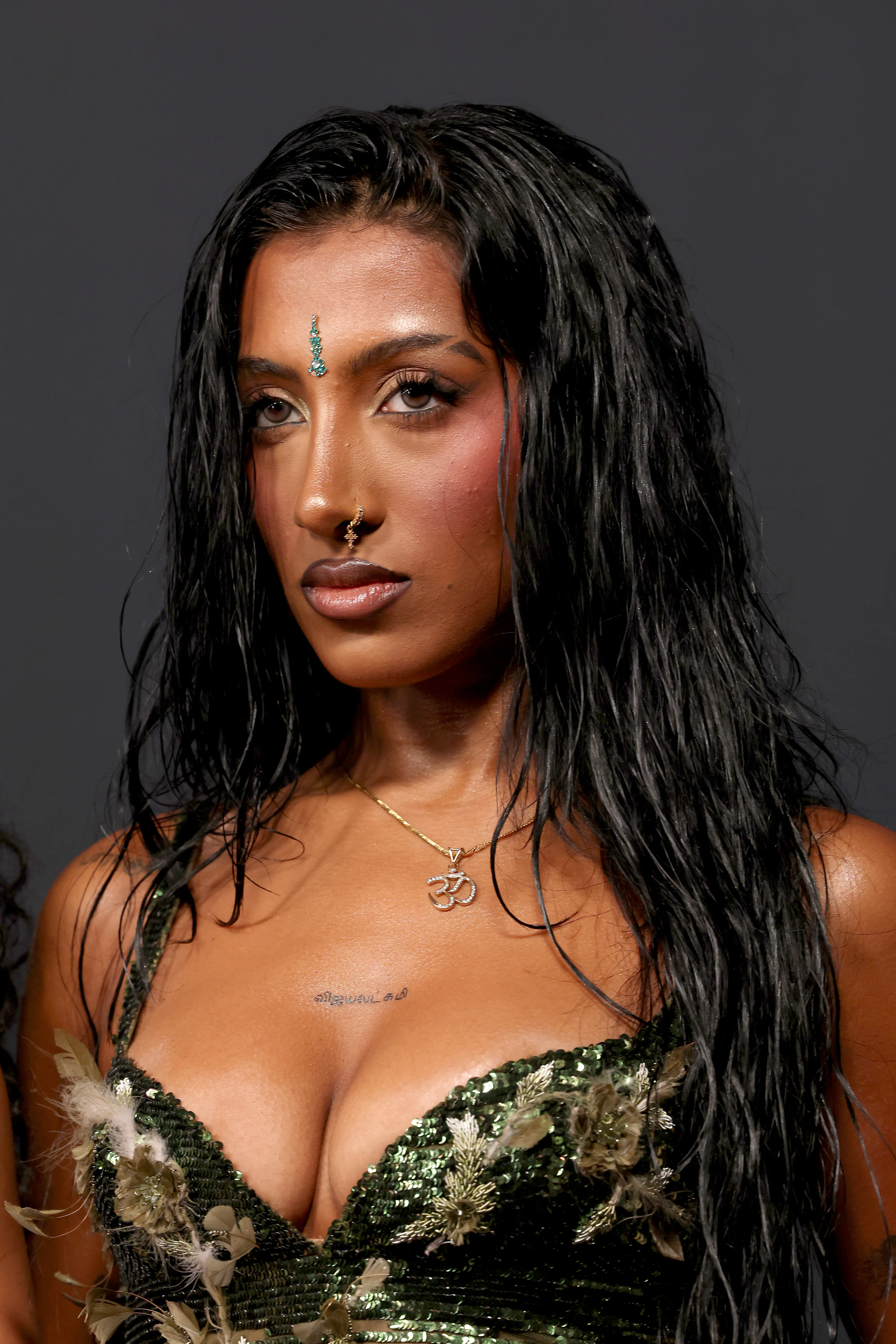 Lara Raja at Spotify Best New Artist 2026 with straight wet-looking hair
