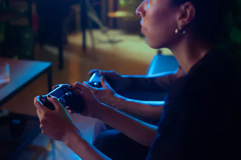 Gamer Hands holding gamepad