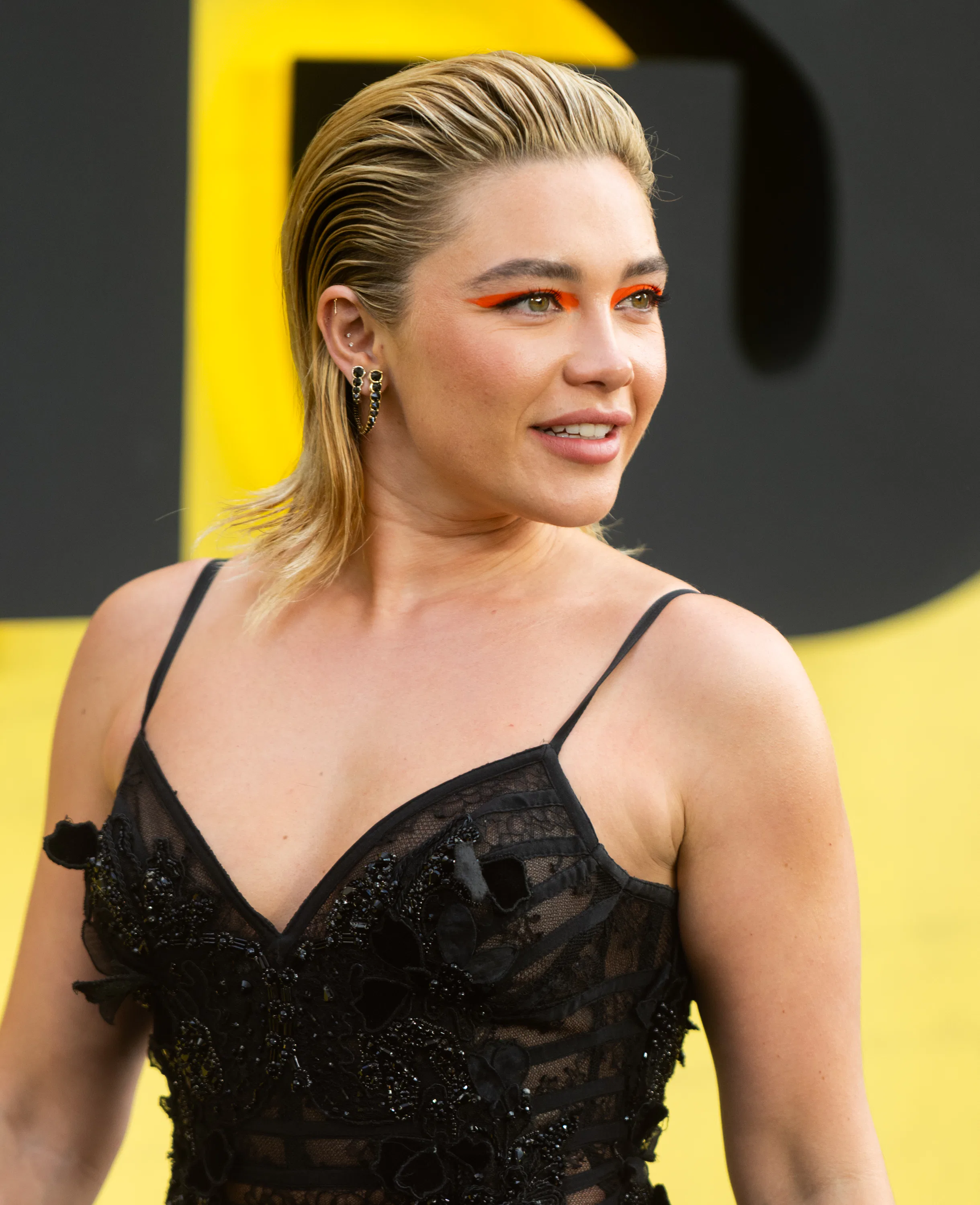 Florence Pugh attends the "Thunderbolts*" UK Special Screening with slicked-back, teased, wet-lookin...