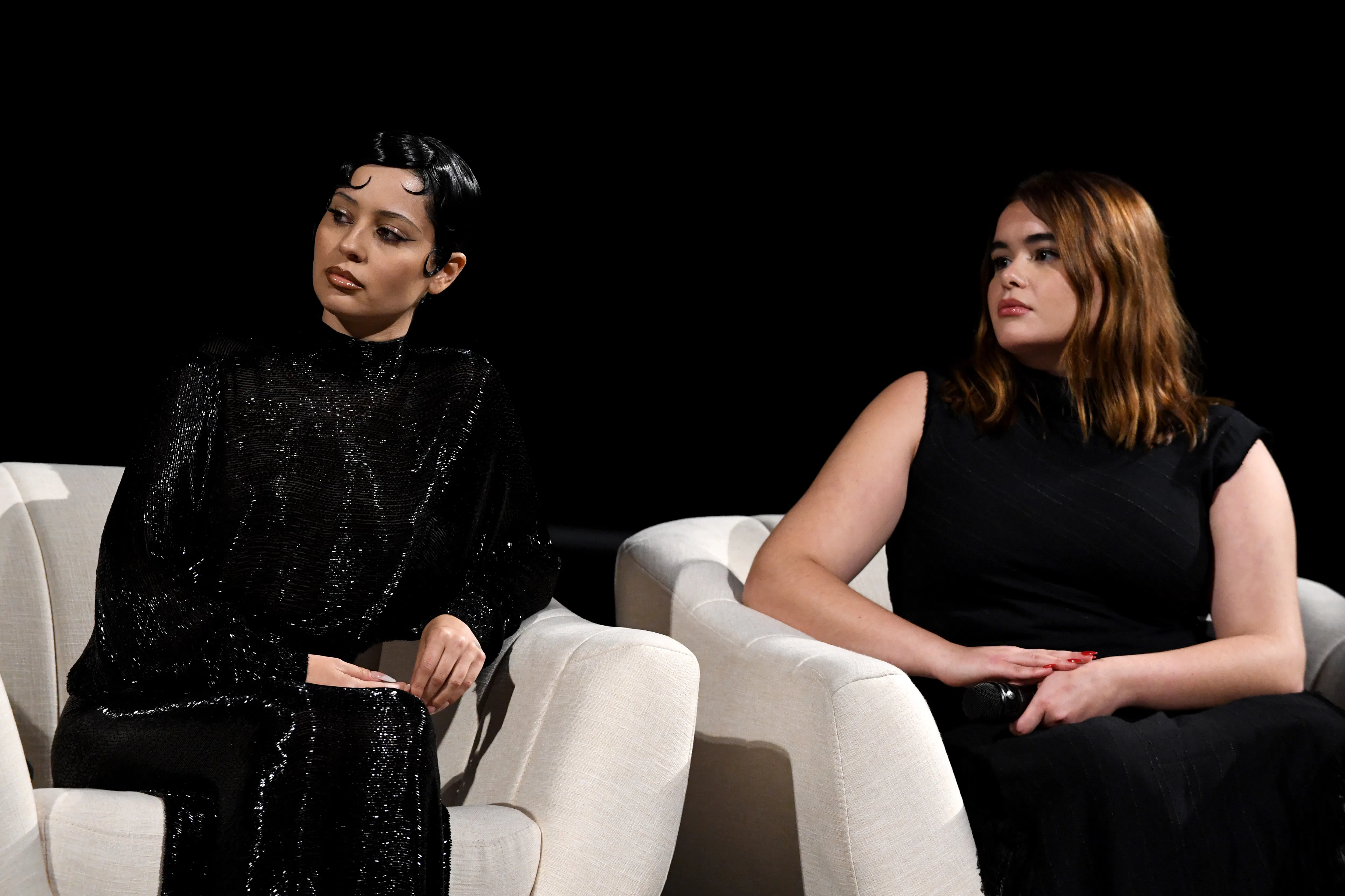 LOS ANGELES, CALIFORNIA - APRIL 20: (L-R)  Alexa Demie and Barbie Ferreira speak onstage during the ...