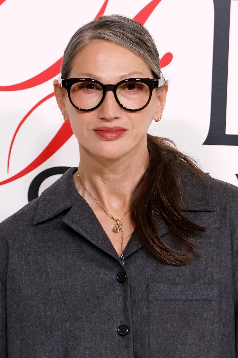 Jenna Lyons with a slicked-back ponytail that shows off her gray hairs