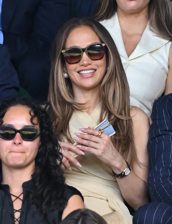 LONDON, ENGLAND - JULY 12: Jennifer Lopez, wearing Ralph Lauren, attends day fourteen of the 2026 Wi...