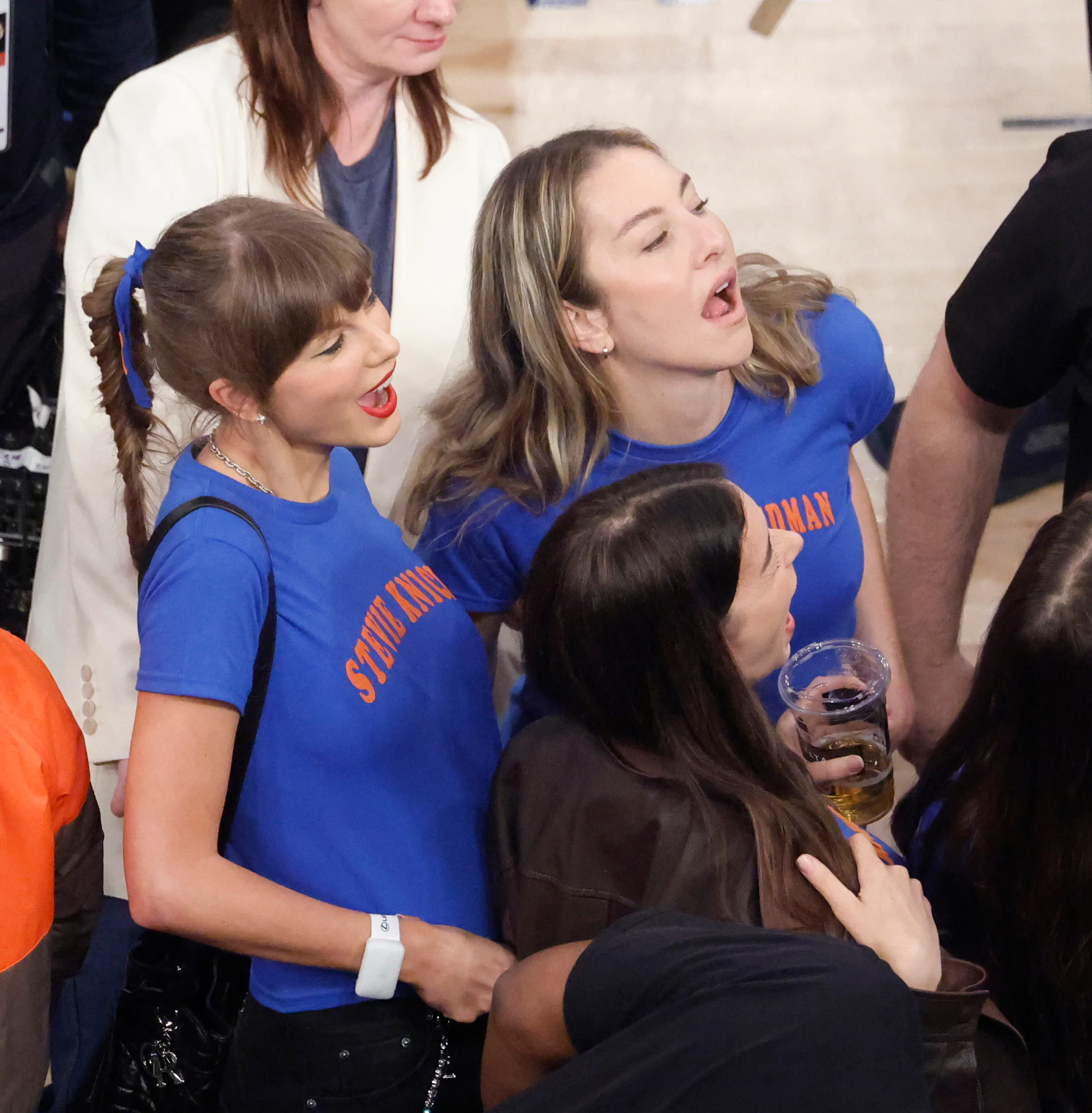 Taylor Swift and friends at the NBA finals with a fishtail ponytail braid