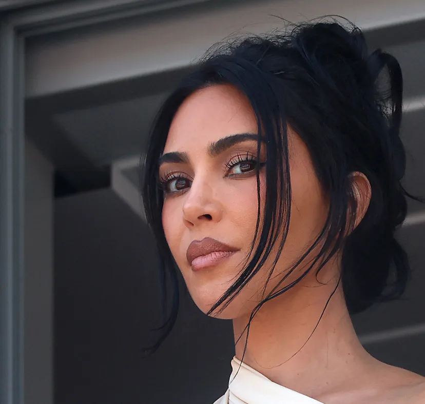 Kim Kardashian explained why she posted lake party pics after her grandma MJ's death.