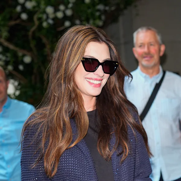 Anne Hathaway out and about in New York City with coppery golden brown highlights