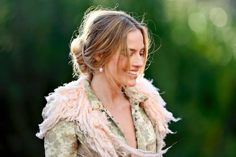 Margot Robbie wearing a tousled bun to promote "Wuthering Heights"