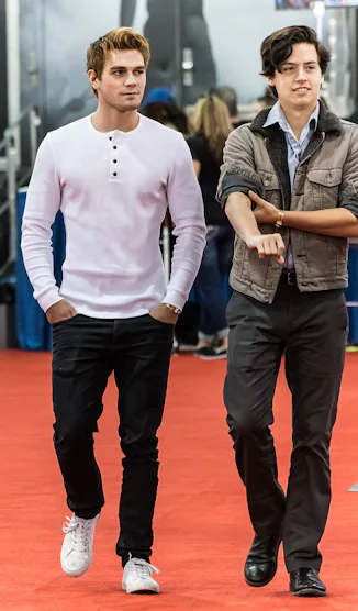 KJ Apa revealed Cole Sprouse once punched him in a strip club due to his drug use.