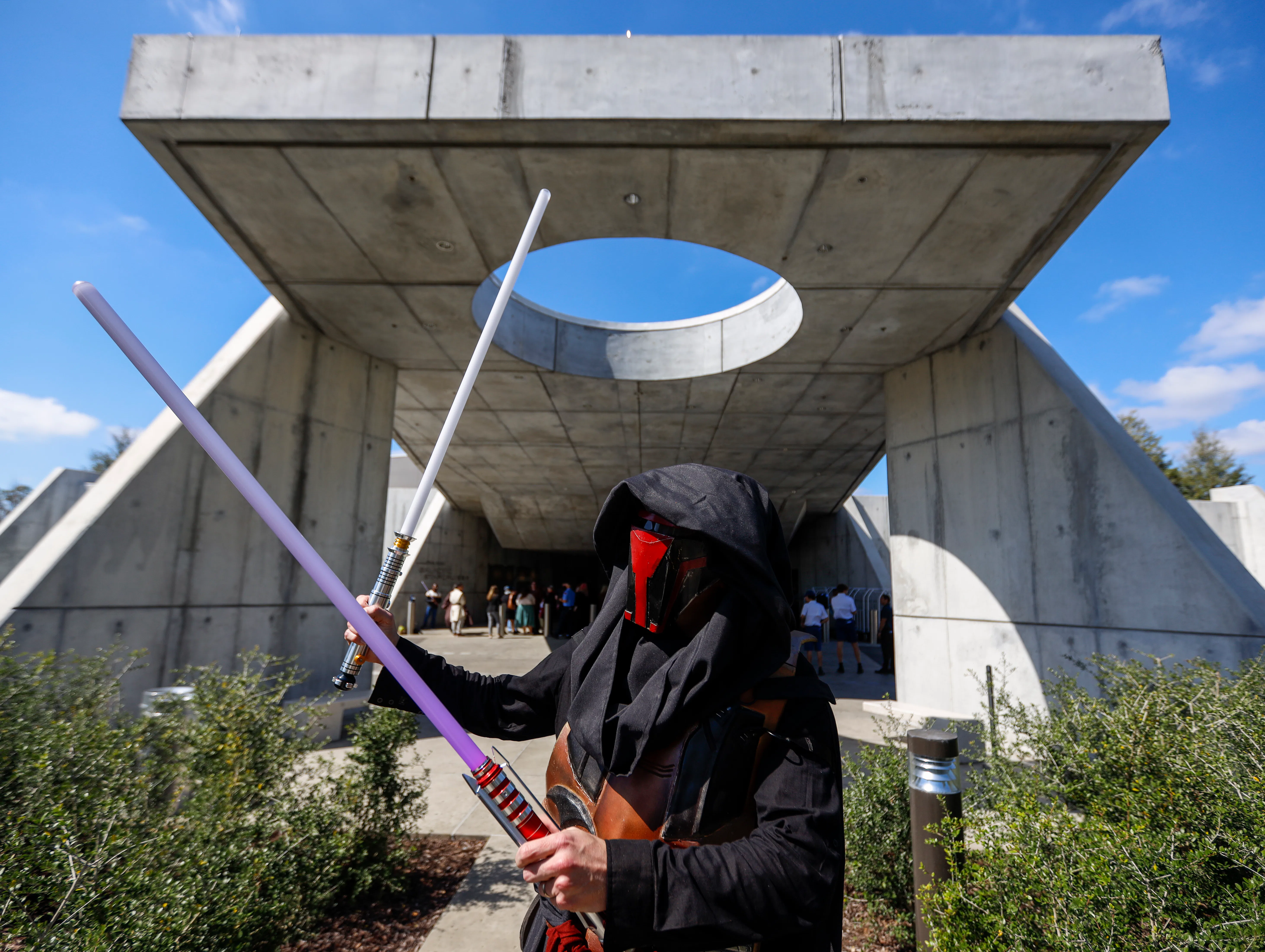 Orlando, Fla - March 01: Chuck Oehrlein of Helena Alabama, poses as Darth Revan, as the first passen...
