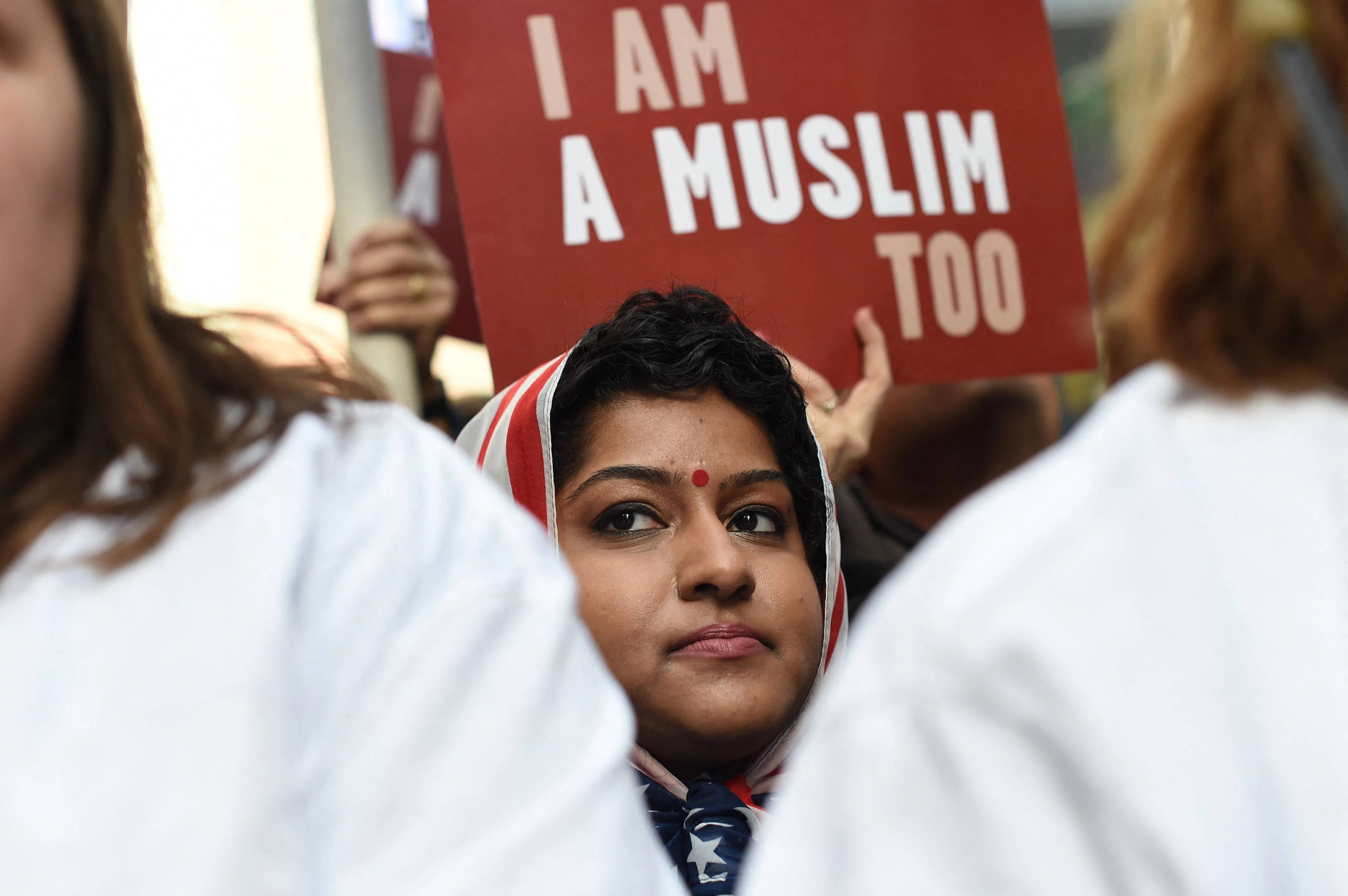 TOPSHOT - Protesters march in New York's Times Square in solidarity with American Muslims and agains...
