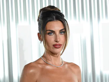 Paige Lorenze slams the "No Influencers" sign at Nantucket store.