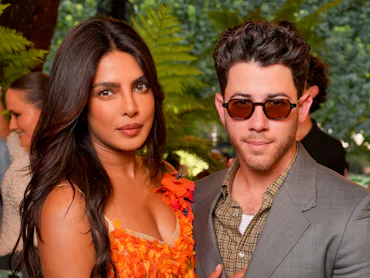 Priyanka Chopra Jonas and Nick Jonas at the Dior fashion show as part of Paris Haute Couture Fall/Wi...