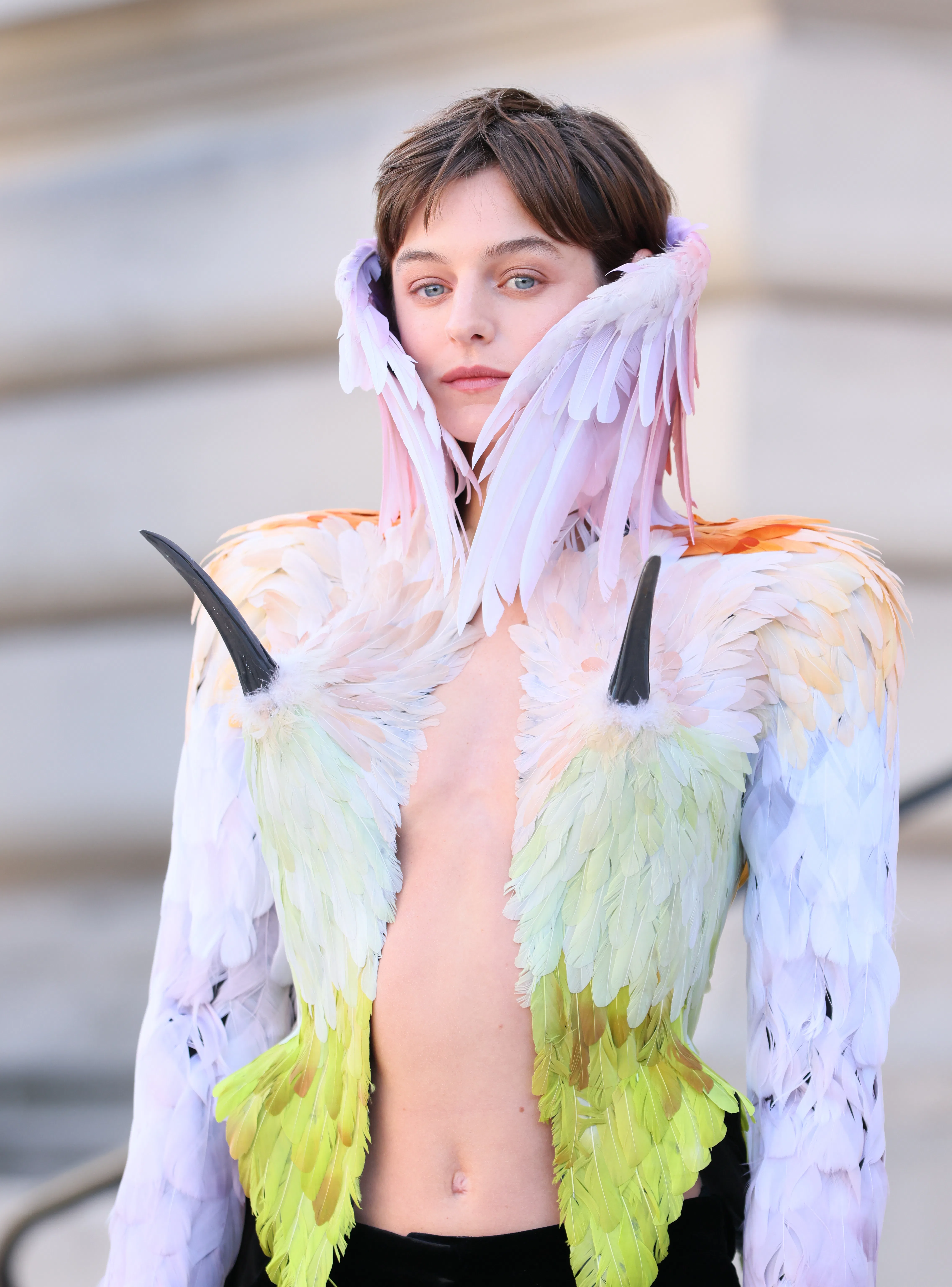 Emma Corrin Flocks to the Schiaparelli Couture Show in a Bold Feathered ...
