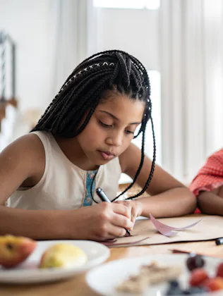 Sisters preparing costume, drawing and doing art and craft at home