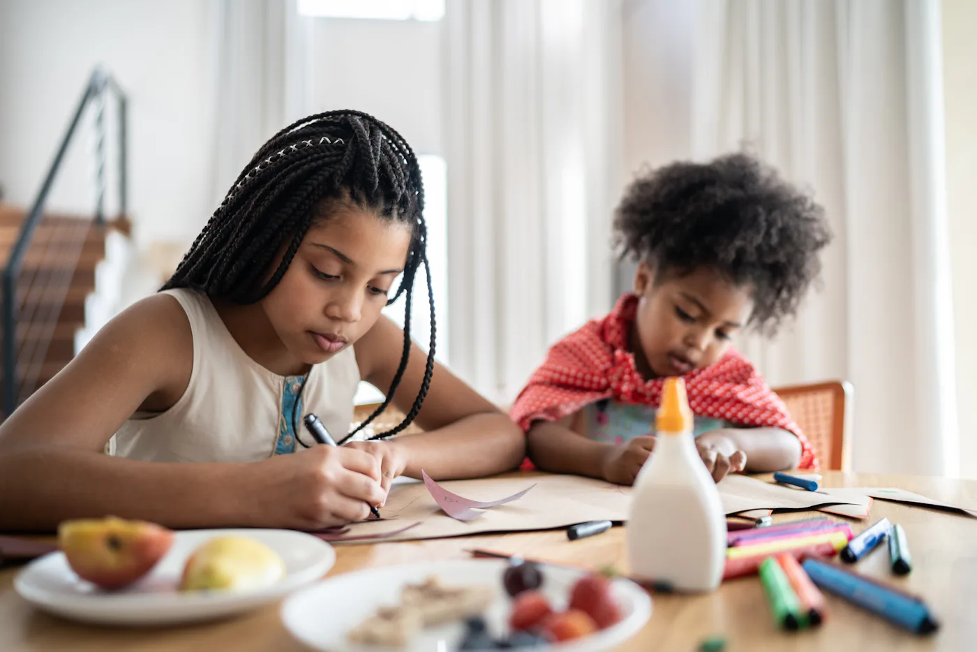 Sisters preparing costume, drawing and doing art and craft at home