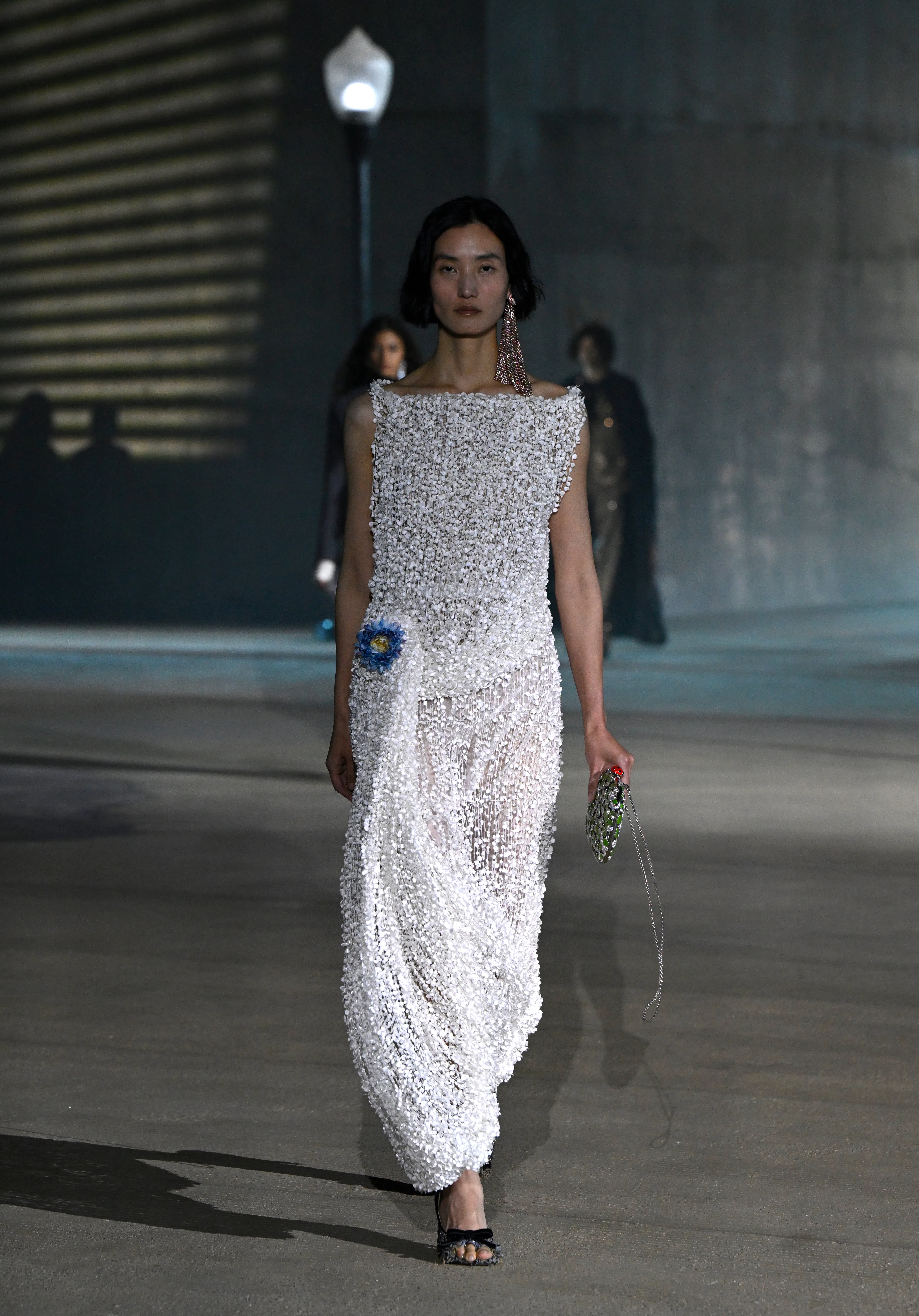 dior silver fringe dress Dior shows pleated, sculptural haute couture dresses in Paris
