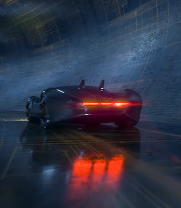 Generic futuristic sports car speeding in the underground tunnel. Vehicle design is not based on any...