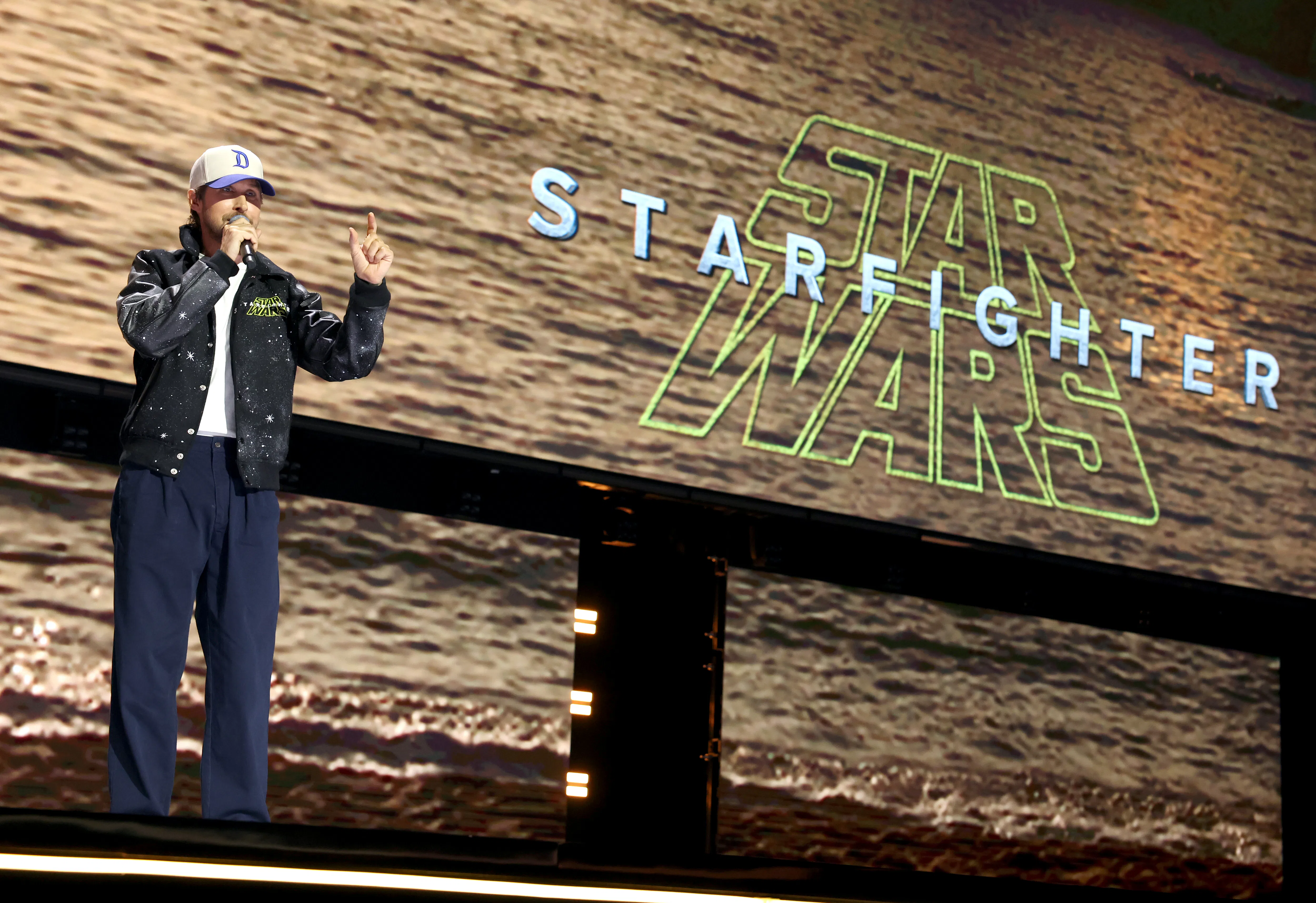 ANAHEIM, CALIFORNIA - AUGUST 14: Ryan Gosling speaks onstage at the Disney Entertainment Showcase at...