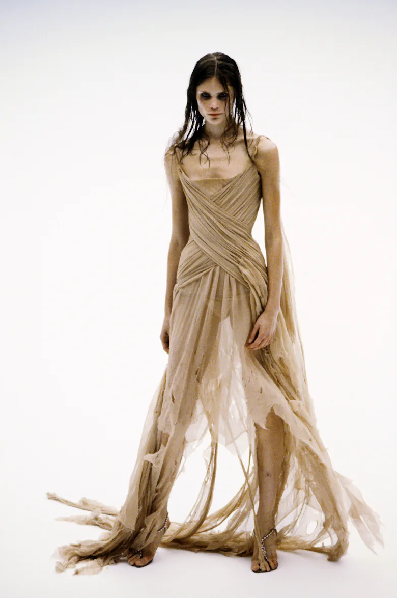 Model on the runway during the Alexander McQueen spring 2003 ready to wear collection. (Photo by Dom...