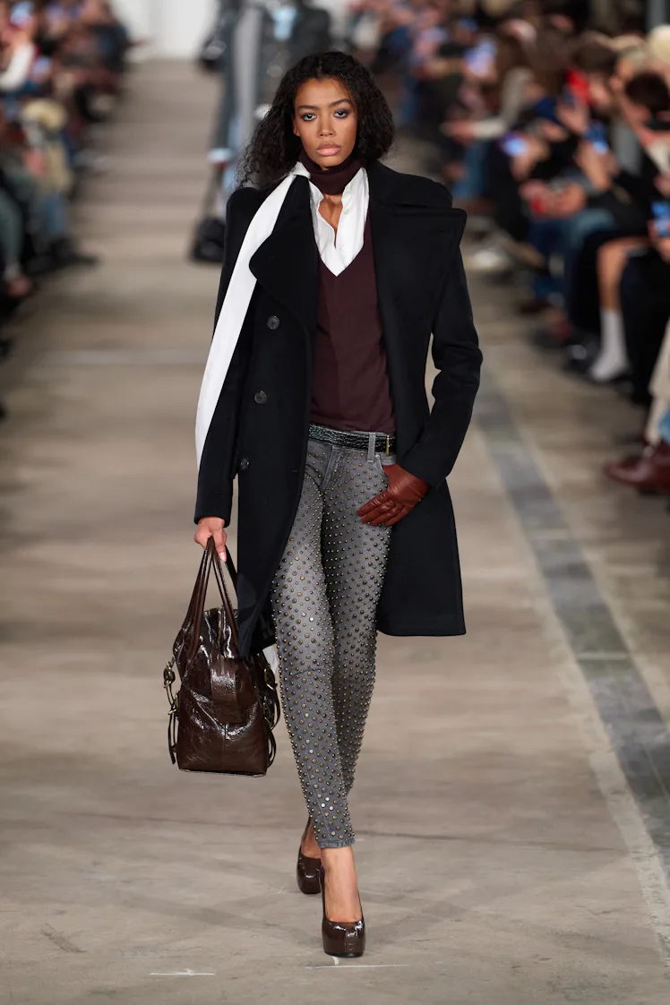 NEW YORK, NEW YORK - FEBRUARY 13: A model walks the runway for the 7 For All Mankind FW26 fashion sh...