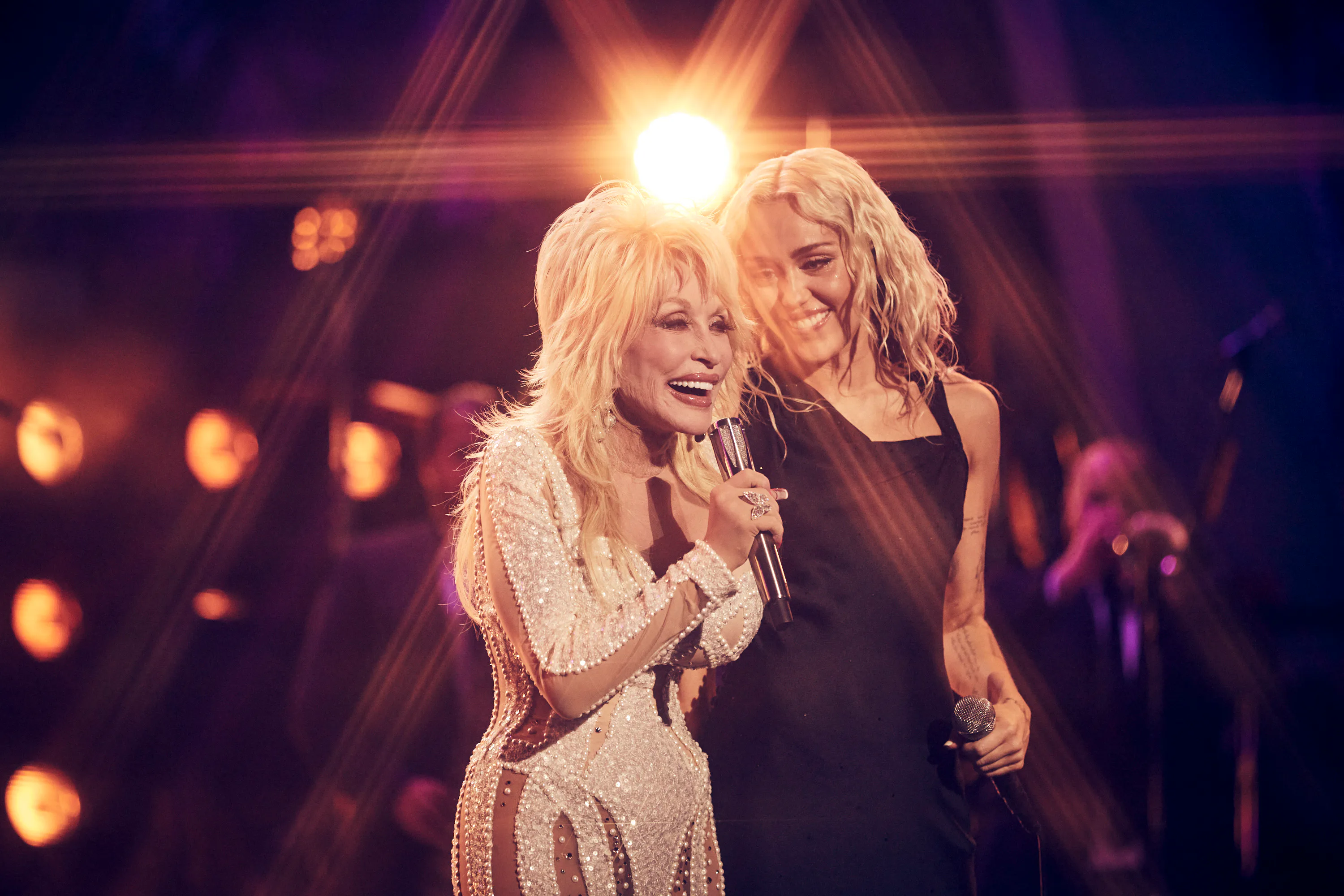 MILEY'S NEW YEAR'S EVE PARTY -- Pictured: (l-r) Dolly Parton and Miley Cyrus -- (Photo by: Vijat Moh...