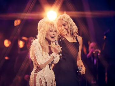MILEY'S NEW YEAR'S EVE PARTY -- Pictured: (l-r) Dolly Parton and Miley Cyrus -- (Photo by: Vijat Moh...