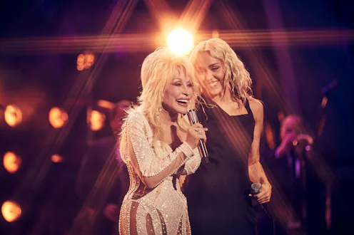 MILEY'S NEW YEAR'S EVE PARTY -- Pictured: (l-r) Dolly Parton and Miley Cyrus -- (Photo by: Vijat Moh...