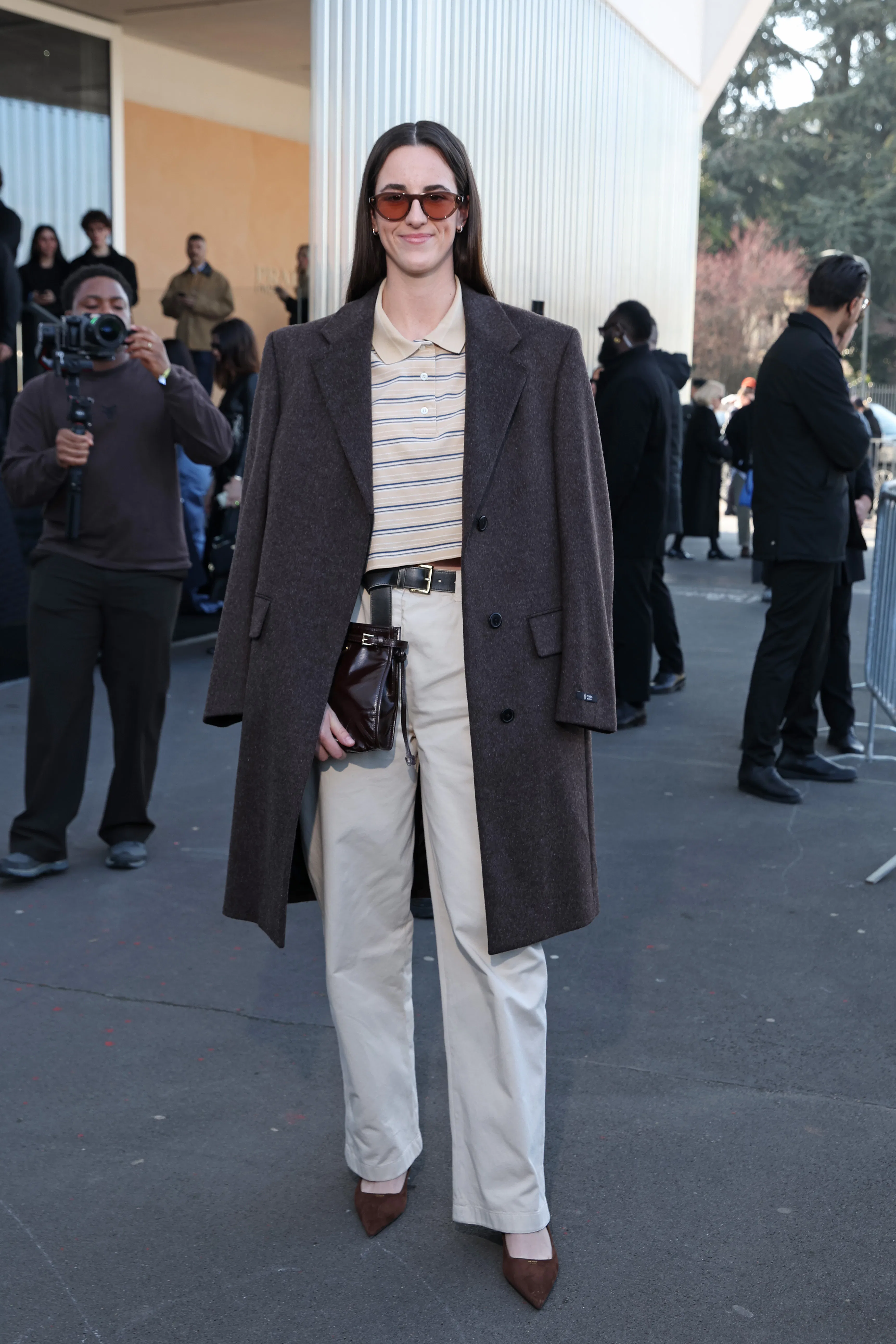 MILAN, ITALY - FEBRUARY 26: Caitlin Clark attends the Prada fashion show during the Milan Menswear F...