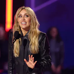 HOLLYWOOD, CALIFORNIA - MARCH 26: Miley Cyrus accepts the Innovator Award onstage during the 2026 iH...