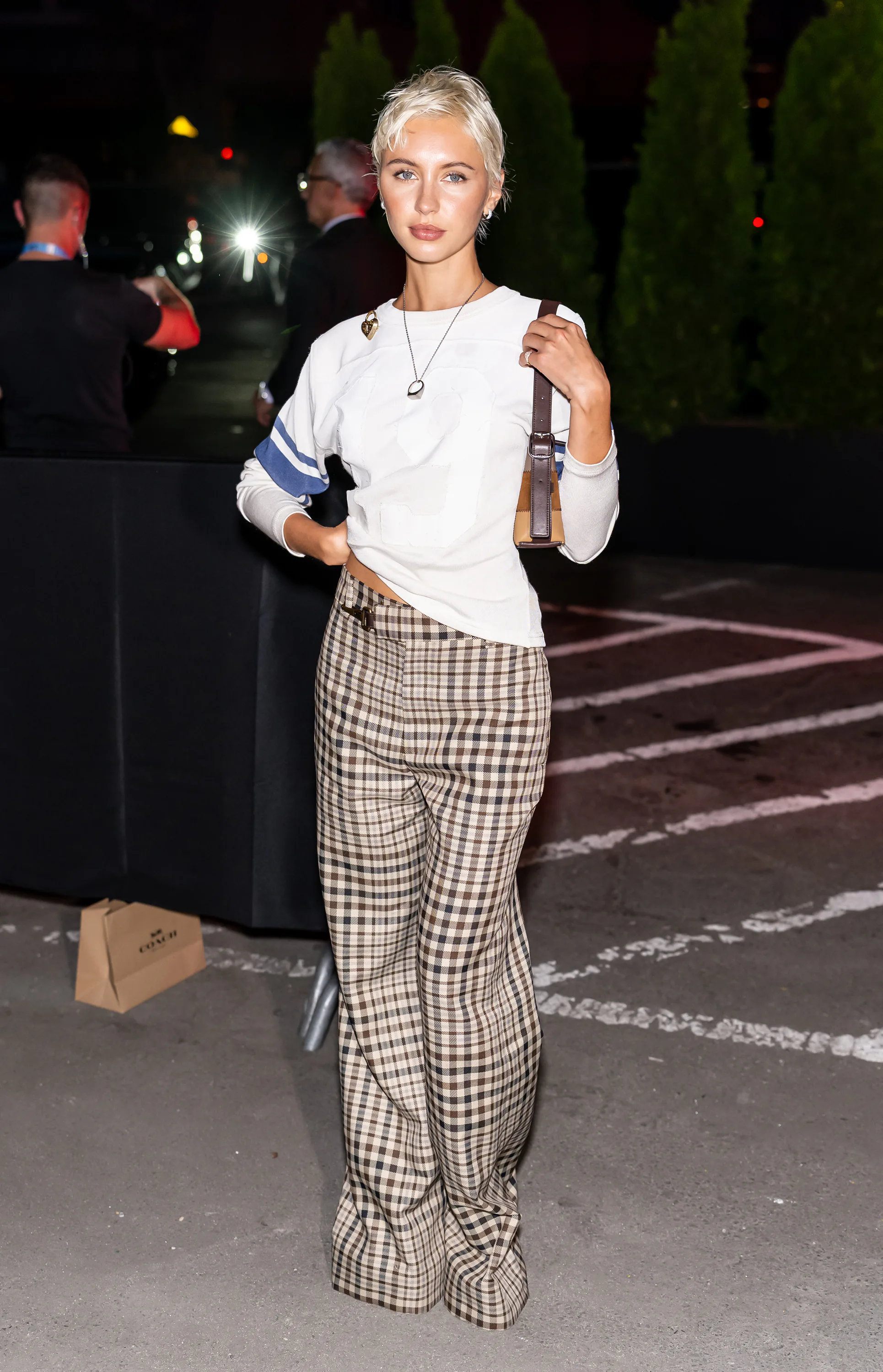 NEW YORK, NEW YORK - SEPTEMBER 09: Iris Law attends the Coach Spring/Summer 2027 fashion show during...